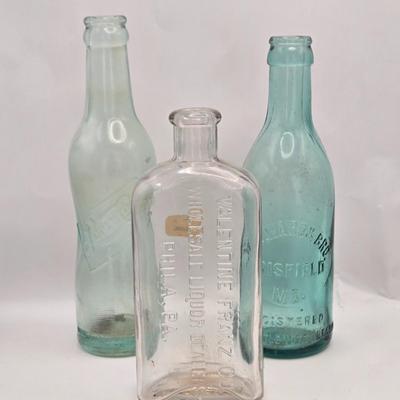 LOT 161: Multiple Vintage/Antique Glass Bottles Including Blue Tenpin Soda, Hires Root Beer, Flavoring Extracts, and More