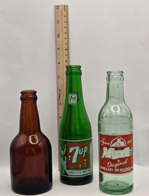 LOT 161: Multiple Vintage/Antique Glass Bottles Including Blue Tenpin Soda, Hires Root Beer, Flavoring Extracts, and More