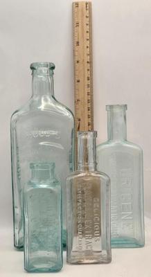 LOT 161: Multiple Vintage/Antique Glass Bottles Including Blue Tenpin Soda, Hires Root Beer, Flavoring Extracts, and More