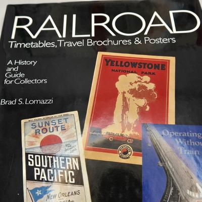 LOT 163: Railroad Maps of N. America Book, & Other Railroad Books, Lionel Blue Comet Train, Multiple Railroad Pins, B&O Railroad...