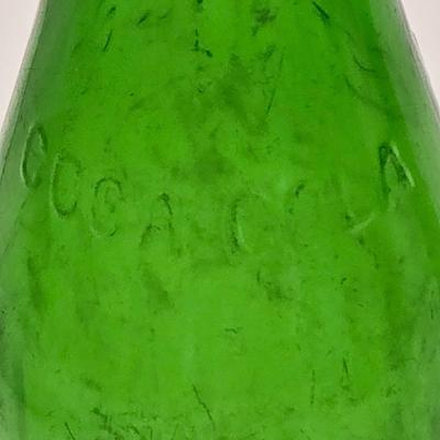 LOT 164: Have a Coke and a Smile: Multiple Vintage Coca-Cola Collectors Items Including Bottles, Glass Paperweight, Metal tray, and Much...