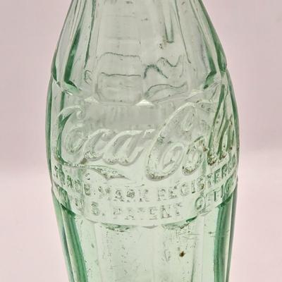 LOT 164: Have a Coke and a Smile: Multiple Vintage Coca-Cola Collectors Items Including Bottles, Glass Paperweight, Metal tray, and Much...