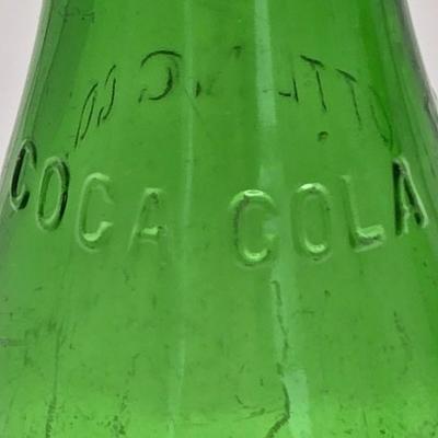 LOT 164: Have a Coke and a Smile: Multiple Vintage Coca-Cola Collectors Items Including Bottles, Glass Paperweight, Metal tray, and Much...