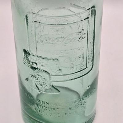LOT 164: Have a Coke and a Smile: Multiple Vintage Coca-Cola Collectors Items Including Bottles, Glass Paperweight, Metal tray, and Much...