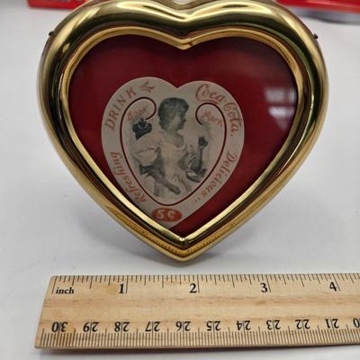 LOT 164: Have a Coke and a Smile: Multiple Vintage Coca-Cola Collectors Items Including Bottles, Glass Paperweight, Metal tray, and Much...