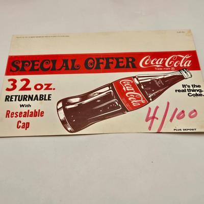 LOT 164: Have a Coke and a Smile: Multiple Vintage Coca-Cola Collectors Items Including Bottles, Glass Paperweight, Metal tray, and Much...