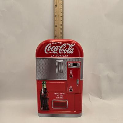 LOT 164: Have a Coke and a Smile: Multiple Vintage Coca-Cola Collectors Items Including Bottles, Glass Paperweight, Metal tray, and Much...