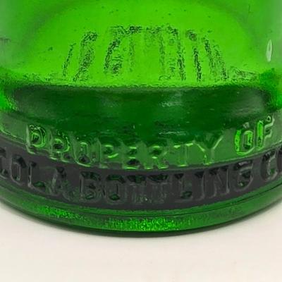 LOT 164: Have a Coke and a Smile: Multiple Vintage Coca-Cola Collectors Items Including Bottles, Glass Paperweight, Metal tray, and Much...