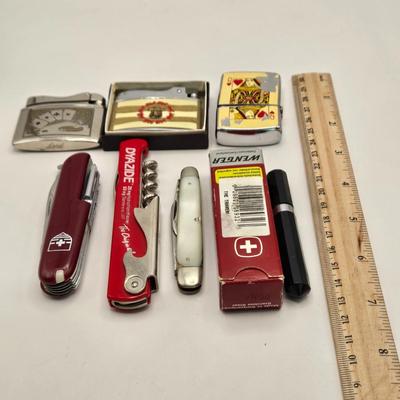 LOT 171: Five Vintage Lighters, 2 Swiss Army Knives, Mother of Pearl Pocket Knife, and Promotional Cork Screw/Knife