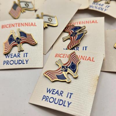 LOT 176: Numerous Vintage Friendship Flag Lapel Pins