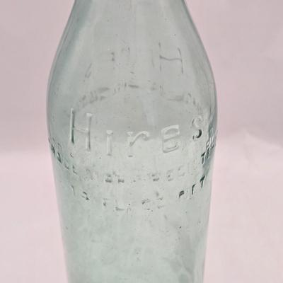 LOT 183: Multiple Vintage Glass Bottles Including Whistle, Scott's Emulsion, Hires, Big Frosty, and Many More