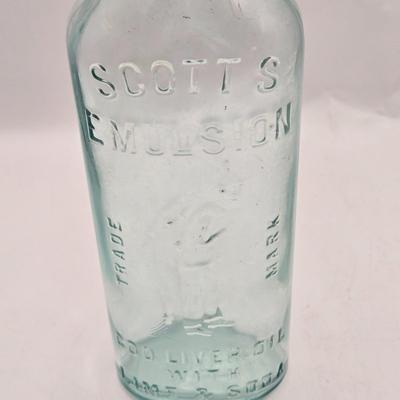 LOT 183: Multiple Vintage Glass Bottles Including Whistle, Scott's Emulsion, Hires, Big Frosty, and Many More