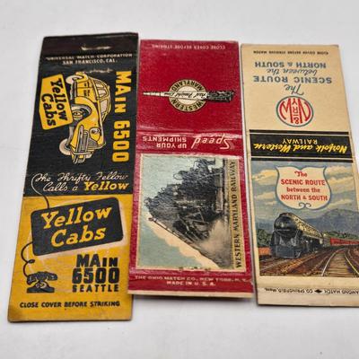 LOT 193: Vintage Cigarette Advertisements, Lucky Strike Bridge , Camel Brand Lighters, and More