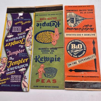 LOT 193: Vintage Cigarette Advertisements, Lucky Strike Bridge , Camel Brand Lighters, and More