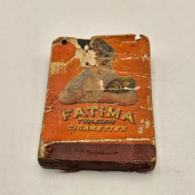 LOT 193: Vintage Cigarette Advertisements, Lucky Strike Bridge , Camel Brand Lighters, and More