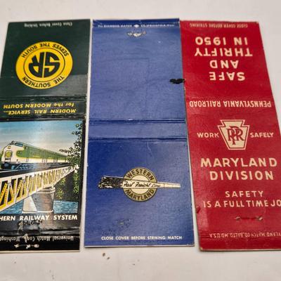 LOT 193: Vintage Cigarette Advertisements, Lucky Strike Bridge , Camel Brand Lighters, and More