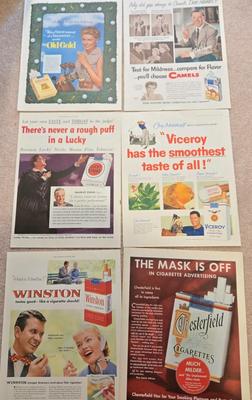 LOT 193: Vintage Cigarette Advertisements, Lucky Strike Bridge , Camel Brand Lighters, and More