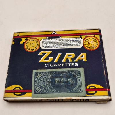 LOT 193: Vintage Cigarette Advertisements, Lucky Strike Bridge , Camel Brand Lighters, and More