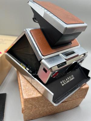 LOT 223: Vintage SX-70 Polaroid Land Camera, Flash and Film