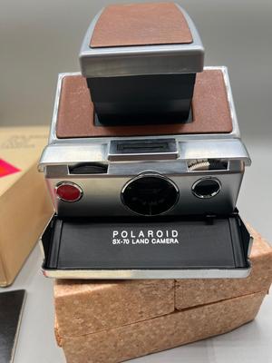 LOT 223: Vintage SX-70 Polaroid Land Camera, Flash and Film