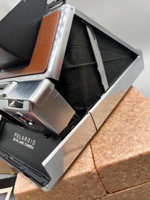 LOT 223: Vintage SX-70 Polaroid Land Camera, Flash and Film