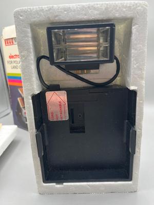 LOT 223: Vintage SX-70 Polaroid Land Camera, Flash and Film