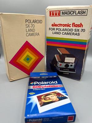LOT 223: Vintage SX-70 Polaroid Land Camera, Flash and Film