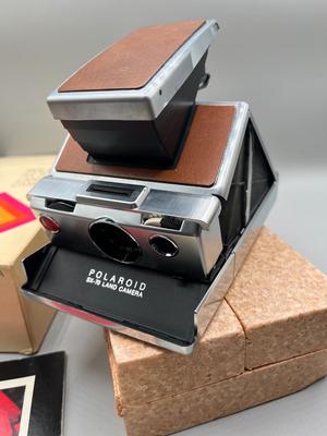 LOT 223: Vintage SX-70 Polaroid Land Camera, Flash and Film