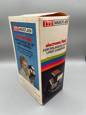 LOT 223: Vintage SX-70 Polaroid Land Camera, Flash and Film