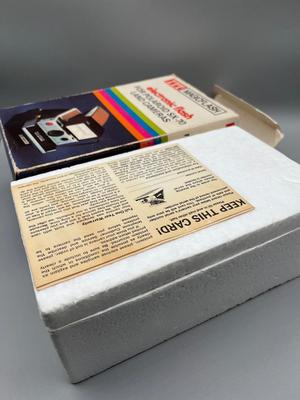 LOT 223: Vintage SX-70 Polaroid Land Camera, Flash and Film