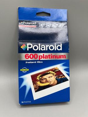 LOT 223: Vintage SX-70 Polaroid Land Camera, Flash and Film