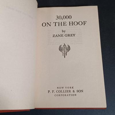 LOT 290: P.F. Collier 1930s Zane Grey Novels w/ Lomax' 1910 Cowboy Songs & More
