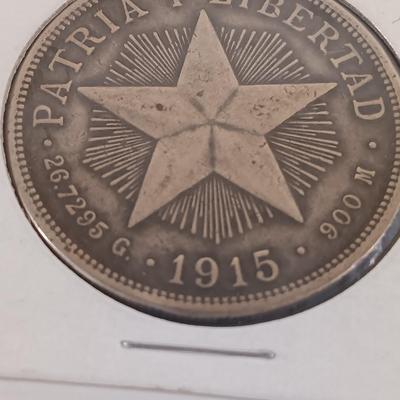 LOT 325: 1897 Cuba 1 Peso Coin & 1915 Cuba 1 Peso Coin