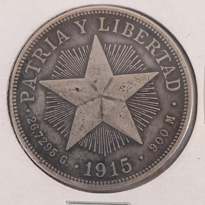 LOT 325: 1897 Cuba 1 Peso Coin & 1915 Cuba 1 Peso Coin