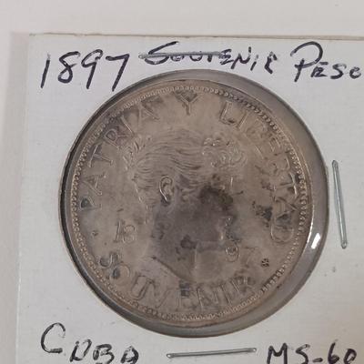 LOT 325: 1897 Cuba 1 Peso Coin & 1915 Cuba 1 Peso Coin