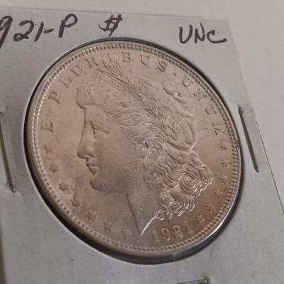 LOT 328: Morgan Silver Dollars 1879 & 1921