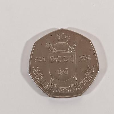 LOT 332: Associated Irish Mine Company 1789 Half Penny with (3) Vintage 50 Pence Pieces
