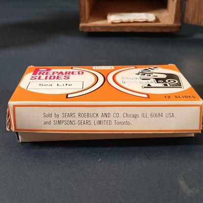LOT 349: Vintage Perfect Model 805 Microscope w/ Sears Sea Life Slide Set, Underwriters Lab. Safety Can & Books