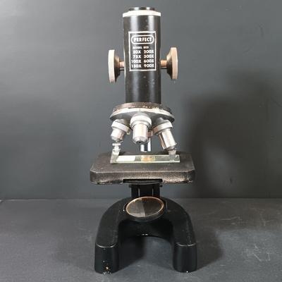 LOT 349: Vintage Perfect Model 805 Microscope w/ Sears Sea Life Slide Set, Underwriters Lab. Safety Can & Books