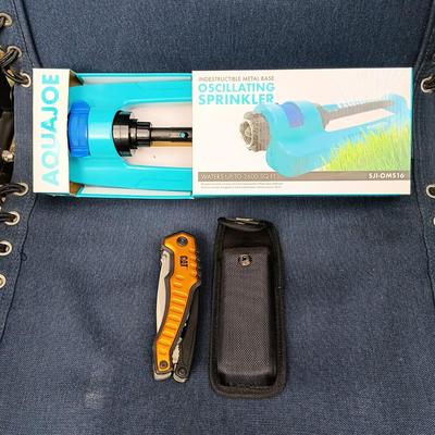 LOT 411: Sunbrella Reclining Chair w/ New/Old Stock Items