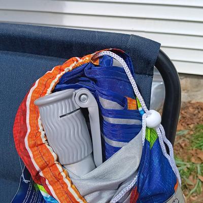 LOT 411: Sunbrella Reclining Chair w/ New/Old Stock Items