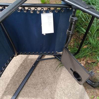 LOT 411: Sunbrella Reclining Chair w/ New/Old Stock Items