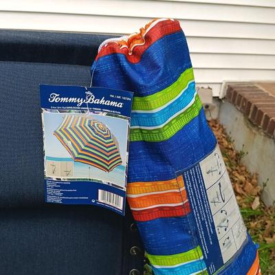 LOT 411: Sunbrella Reclining Chair w/ New/Old Stock Items