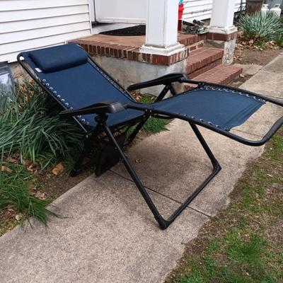 LOT 411: Sunbrella Reclining Chair w/ New/Old Stock Items