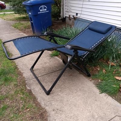 LOT 411: Sunbrella Reclining Chair w/ New/Old Stock Items