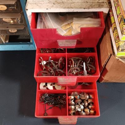 LOT 415: Large Collection of Clock Parts - Weights, Springs, Pendulums, Hands & More