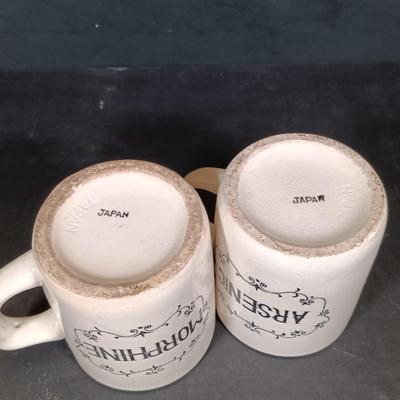 LOT 426: Vintage Japan Made Poison Mugs, Mustache Mug & Books