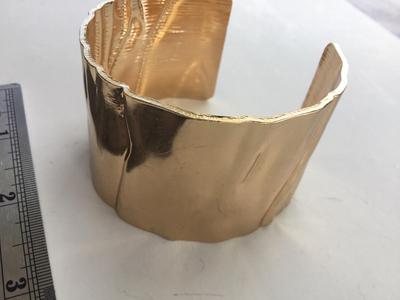 Gold tone cuff bracelet