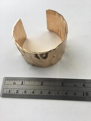 Gold tone cuff bracelet