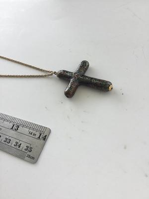 Unmarked gold tone cross necklace